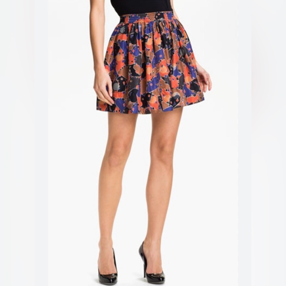 EUC/Like new! MARC BY MARC JACOBS 100 % silk skirt. "flamingo red multi". Small